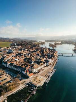 View from above of the old town of Stein and the clear, calm Rhine.