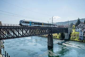 Train crosses the Rhine bridge near Schaffhausen