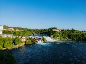 Rhine Falls Spring The Rhine Falls with the Mittelsen in the middle and Schloss Laufen on the right.