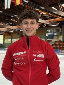 Lukas Britschgi Portrait of Lukas Britschgi. He is wearing a red training jacket. TheSchaffhauserland" logo is on it.