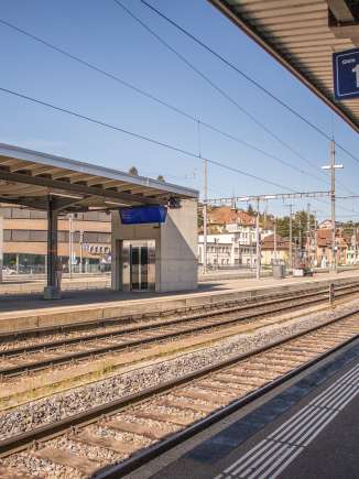 Schaffhausen railroad station View from the platform of platform 1 at Schaffhausen station. A train to Wil is announced on the display.